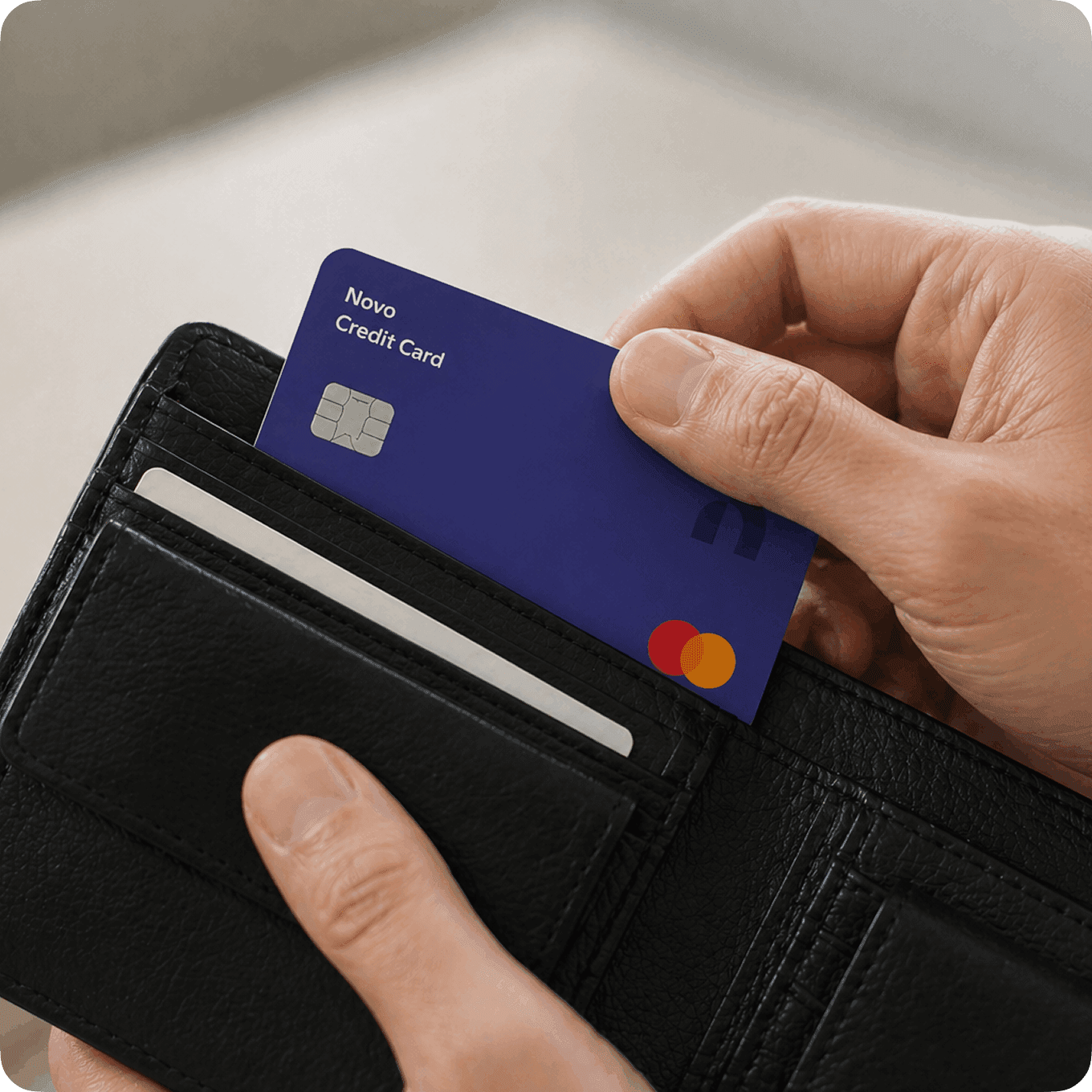 Novo credit card is taken out of a purse