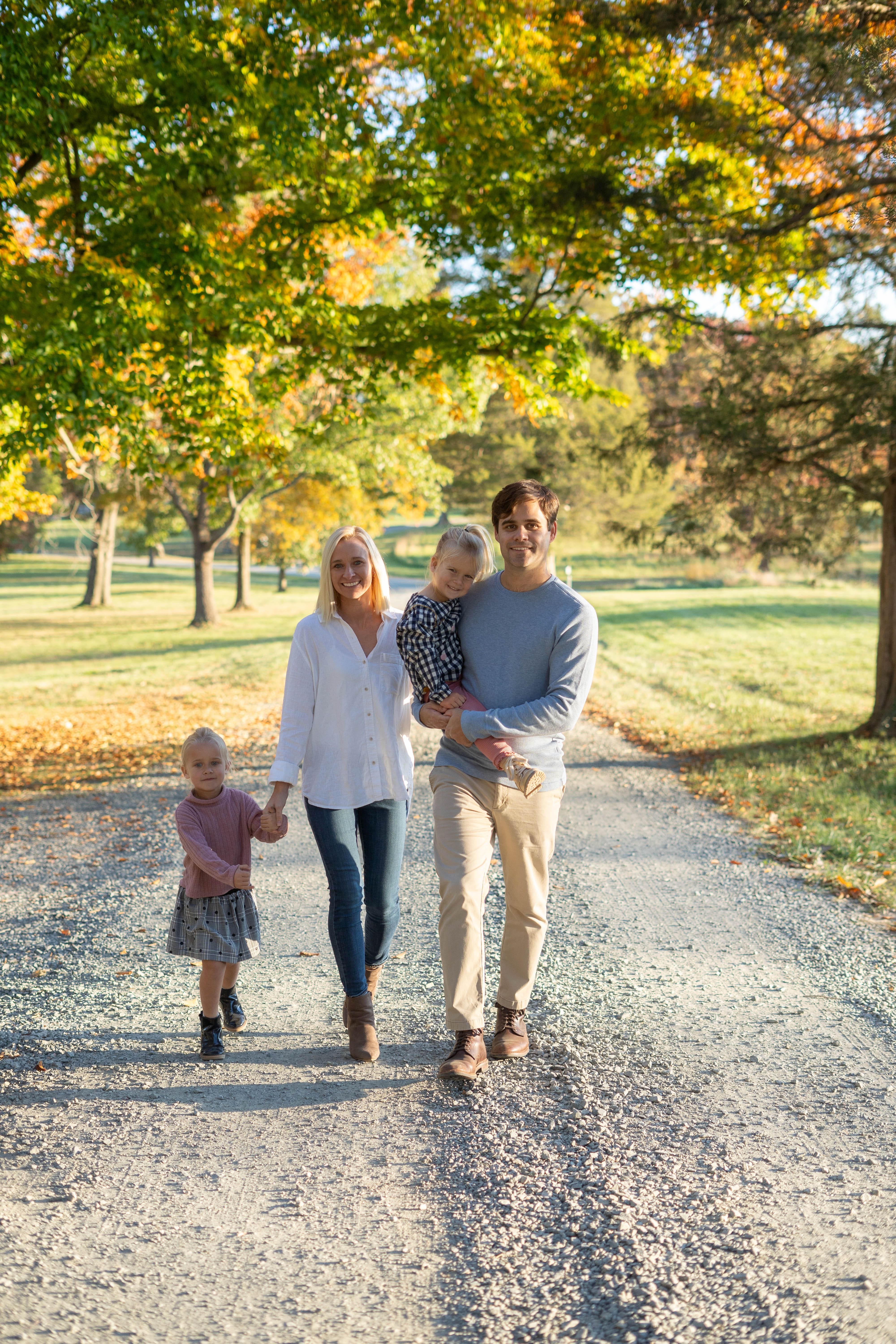 Nikki Benbenek with her husband and co-founder, Scott Benbenek, and their two daughters.